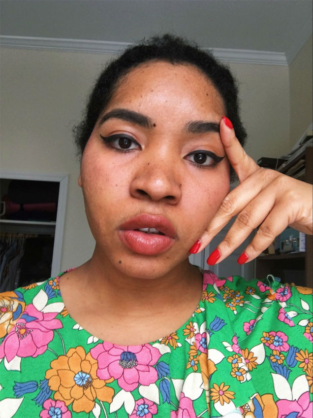 Pretending my janky ponytail makes me look like Sade.